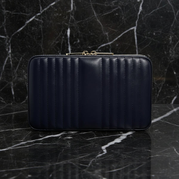 Black quilted wallet on a white background