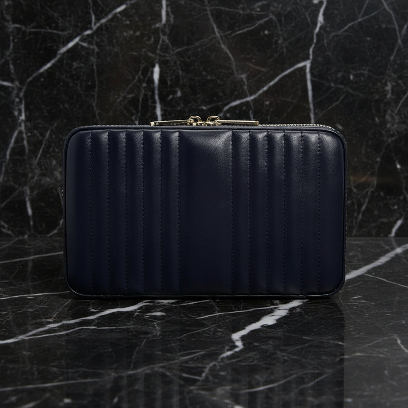 Black quilted wallet on a white background