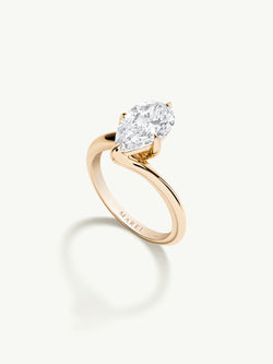 Pythia Serpentine Twist Solitaire Engagement Ring With Brilliant Pear-Cut Diamond In 18K Yellow Gold