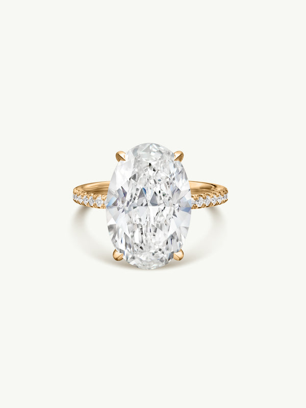 Suma Oval-Shaped Brilliant Cut White Diamond Engagement Ring In 18K Yellow Gold